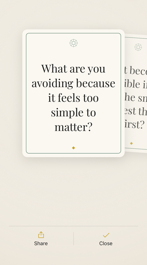 A drawn question card with its deeper question resting alongside