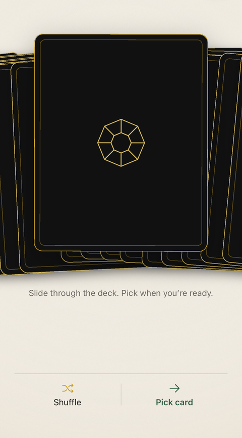 The face-down spread of cards, mid-drag